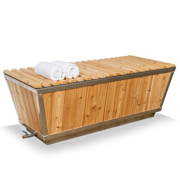 A wooden box with towels on it, perfect for cold plunge therapy or as a Dundalk LeisureCraft The Polar Plunge Tub.