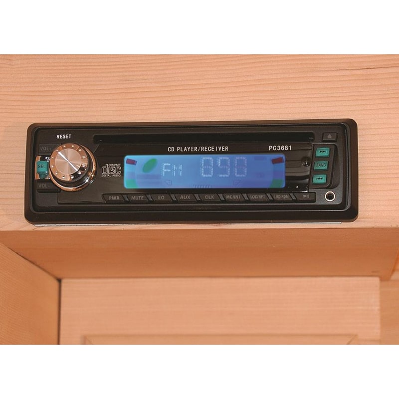 A SunRay Saunas wooden cabinet radio with an LCD display.