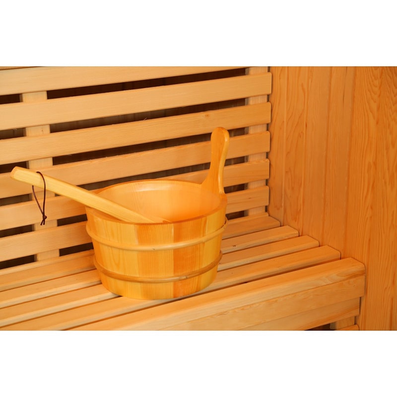 A SunRay Saunas traditional sauna with a wooden bench and a wooden bucket.