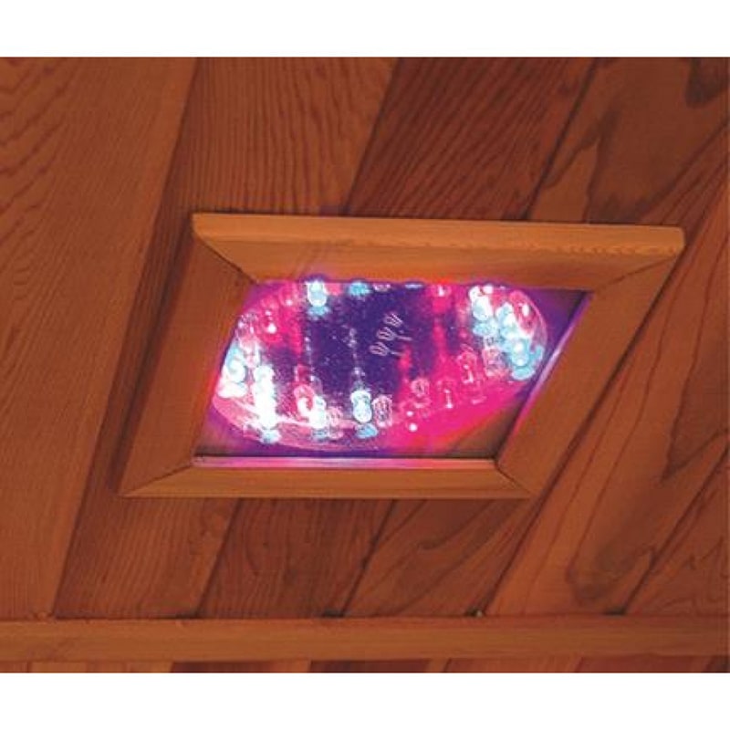 A SunRay Saunas' Roslyn 4 Person Infrared Sauna HL400KS provides a relaxing ambiance with a light bulb softly illuminating the wooden ceiling.